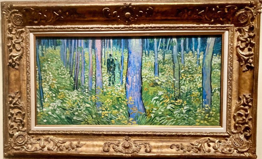 Photo of Vincent van Gogh's Undergrowth with Two Figures, June 1890 framed oil painting.